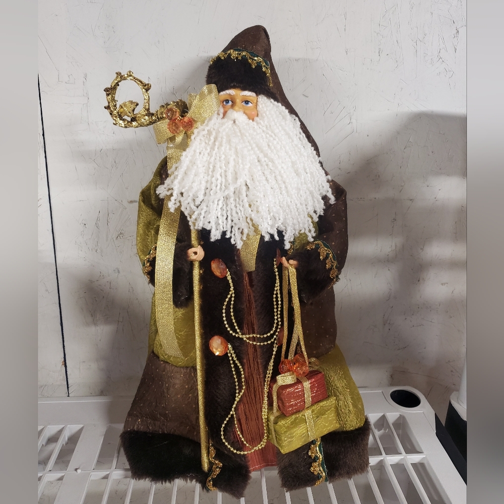 Traditional Green Brown Whimsical Woodsy Santa With Staff And Gifts Tree Topper